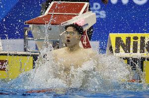 亚洲游泳锦标赛男子100米蛙泳预赛：覃海洋总排名第一晋级